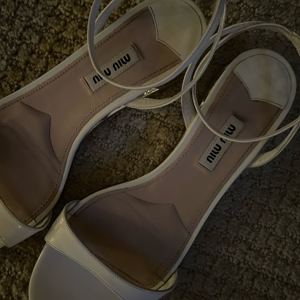 White miu miu heels with reflective mirror soles